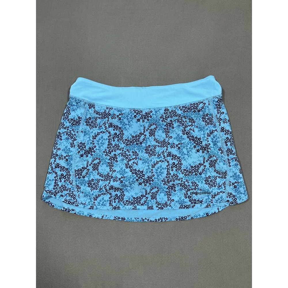 Patagonia Nine Trails Skort features a turquoise and black floral print pattern